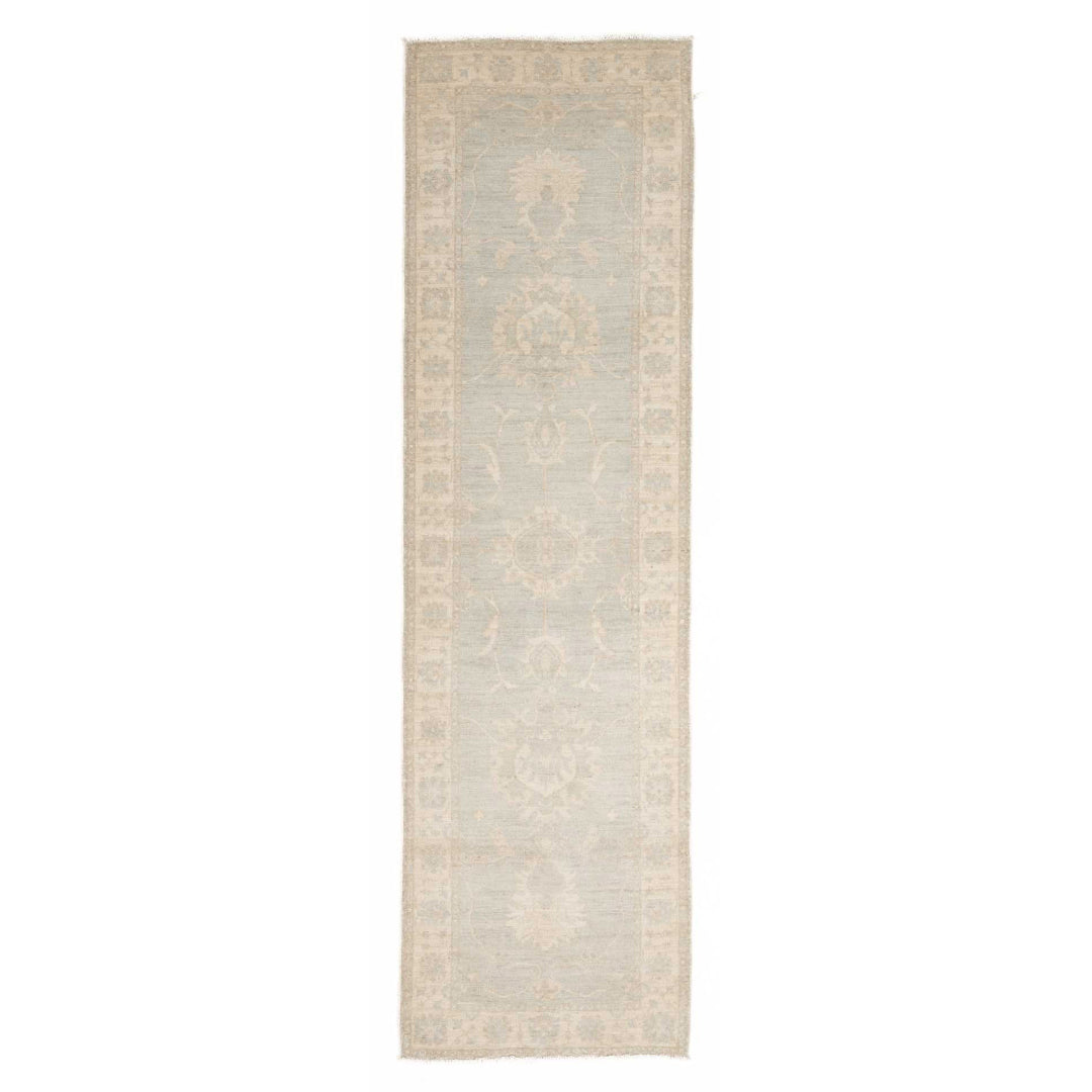 Ultra-faded light blue 2.5x10 Oushak runner rug with ivory floral medallions and a cream border.