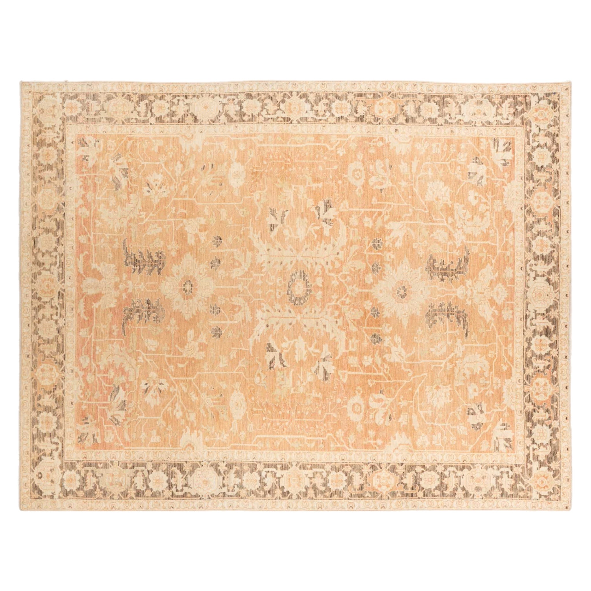 Warm coral-terracotta 9x12 Serapi area rug with cream floral motifs and a deep espresso brown border.