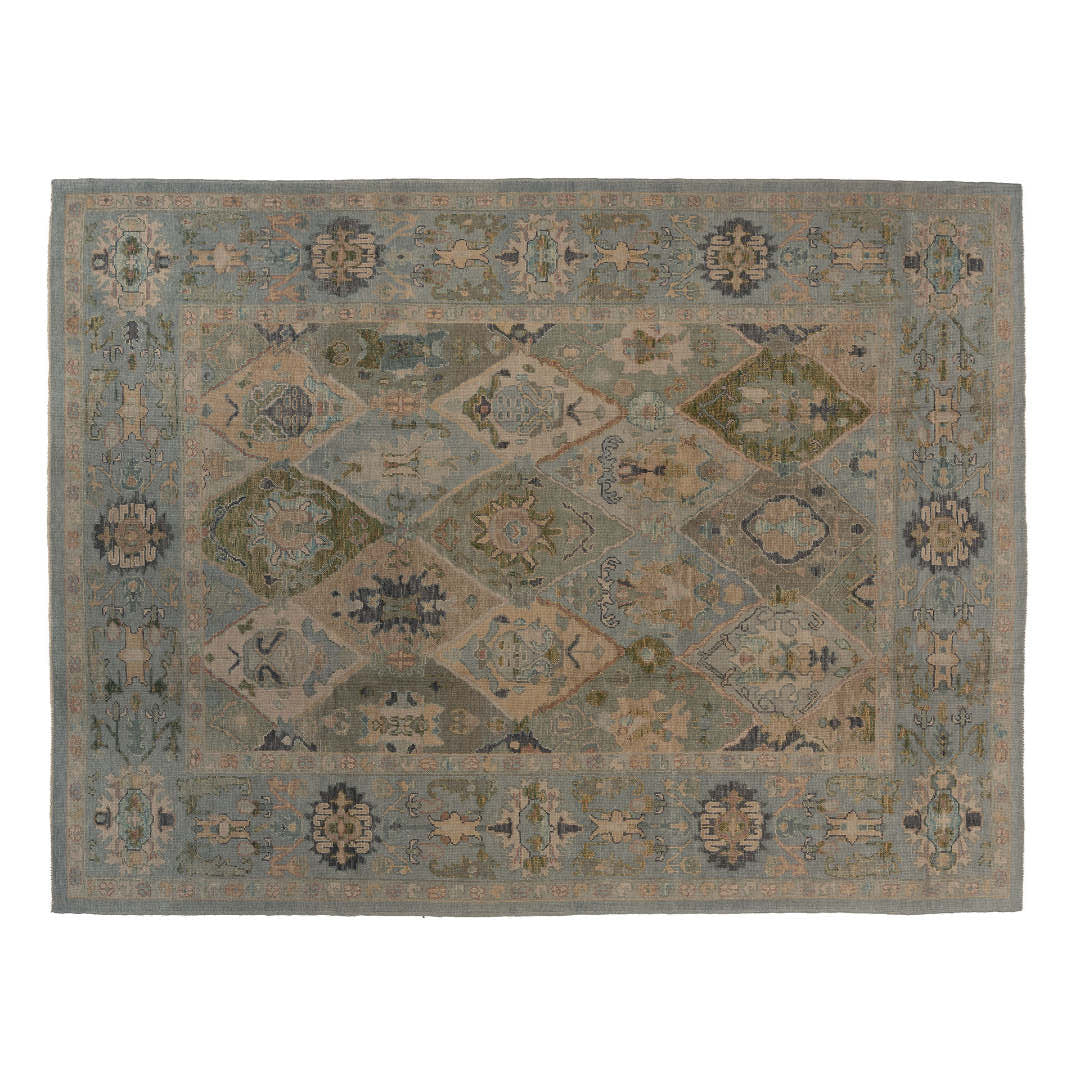 Light blue 9x12 Oushak area rug featuring an allover navy, sage green, and beige diamond trellis lattice pattern.