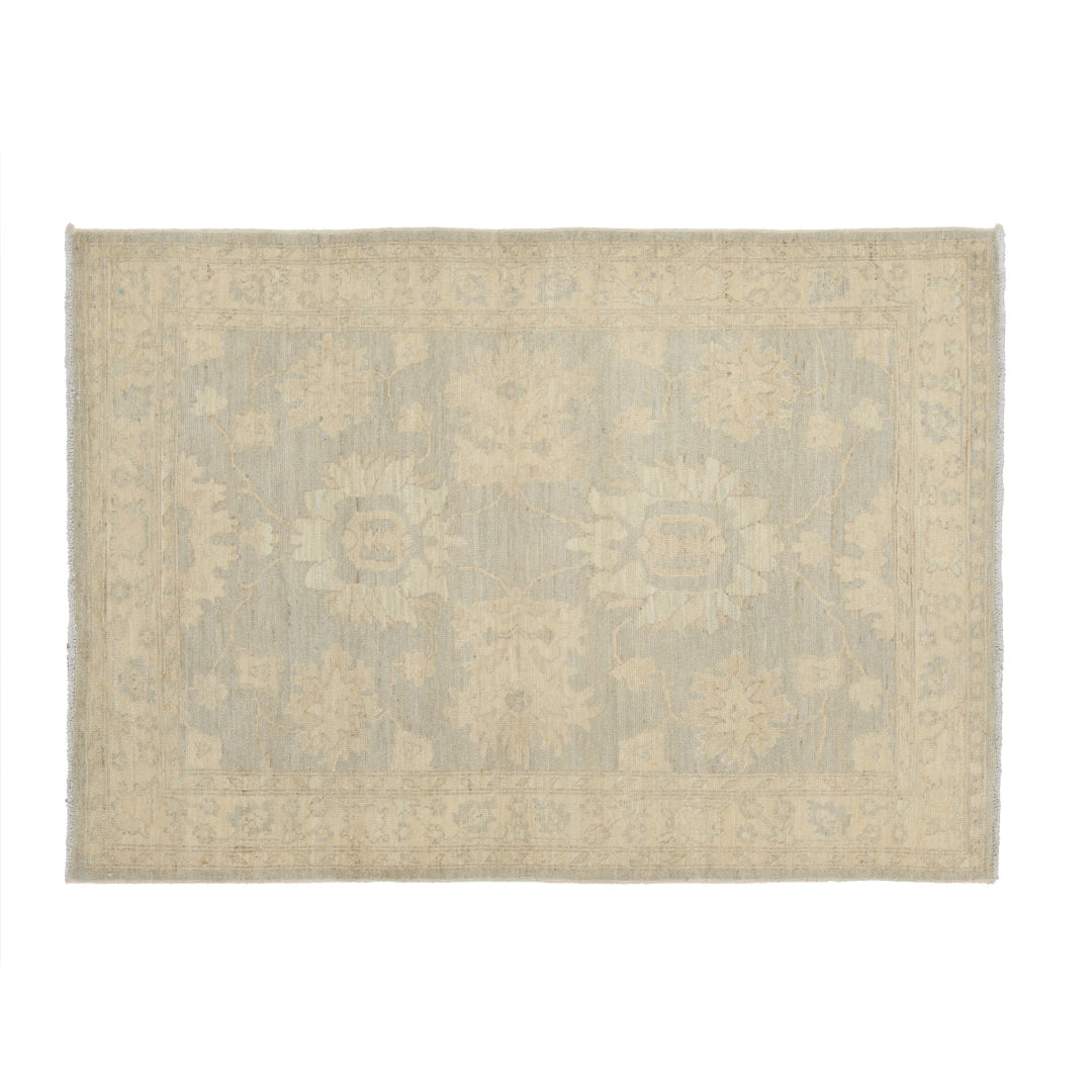 Pale blue 4x6 Oushak area rug with two central cream lotus medallions and a wide beige floral border.