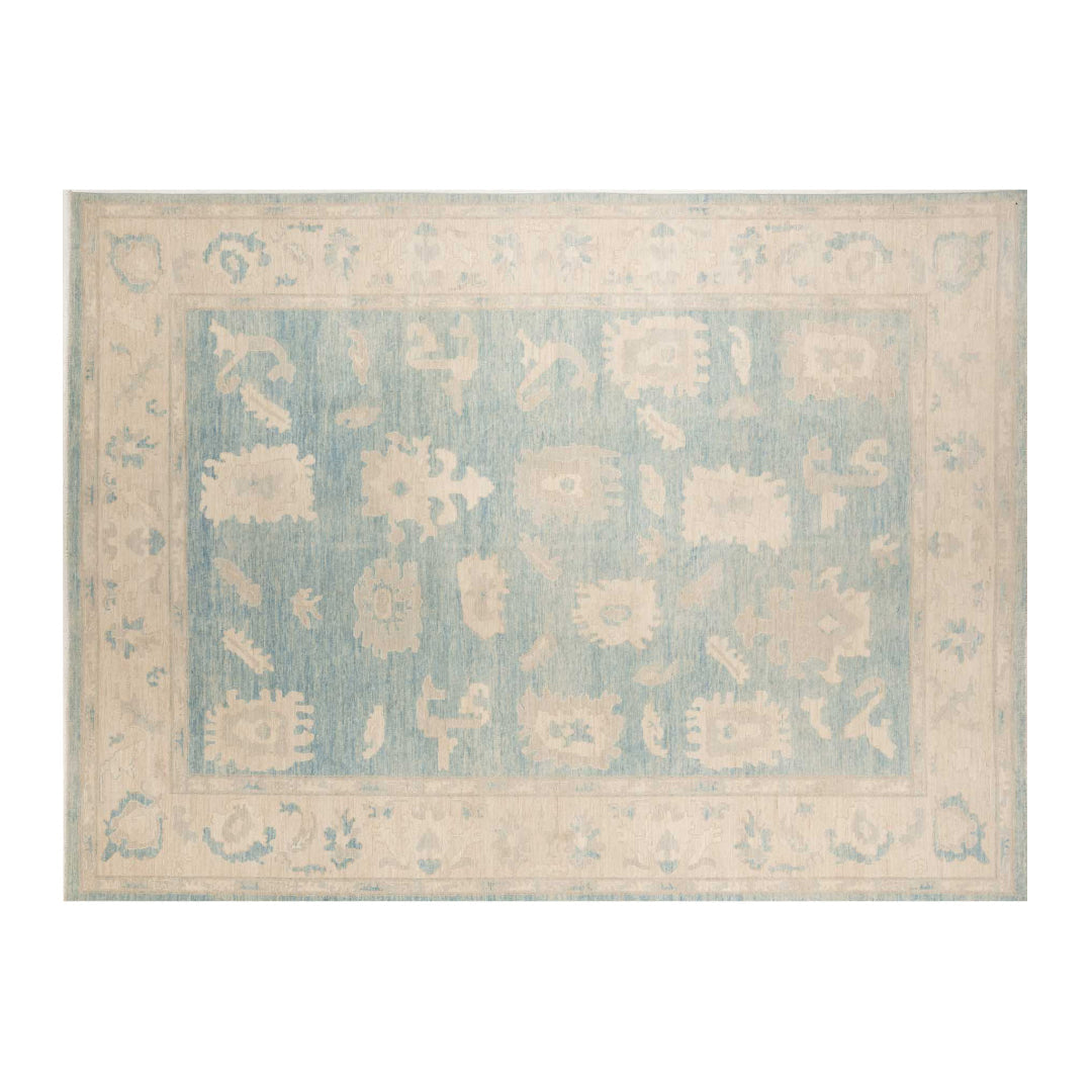 Denim blue 10x14 Oushak area rug with floating cream star medallions and a broad ivory border.