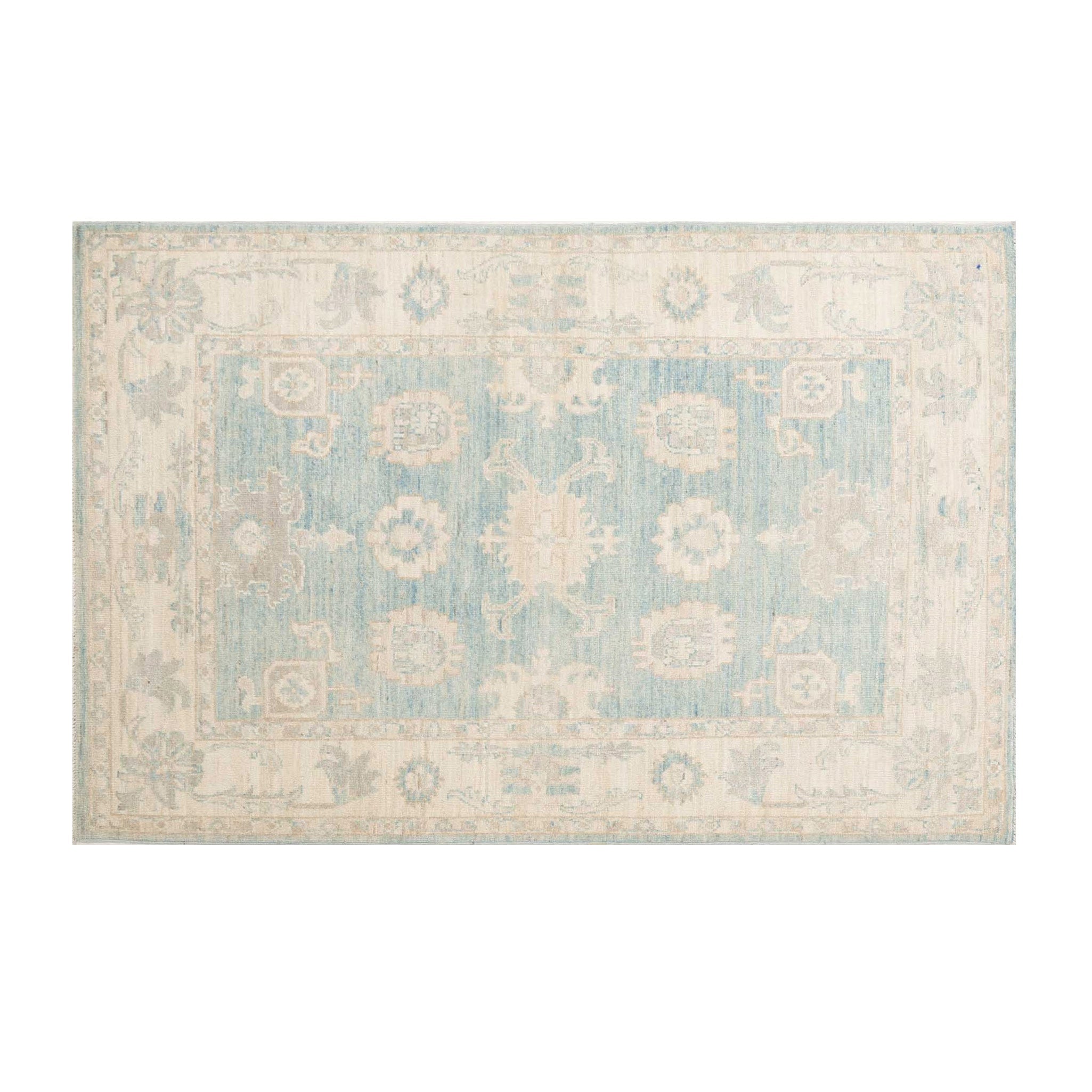 Muted medium blue 4x6 Oushak area rug with warm ivory geometric medallions, botanical details, and a distressed finish.