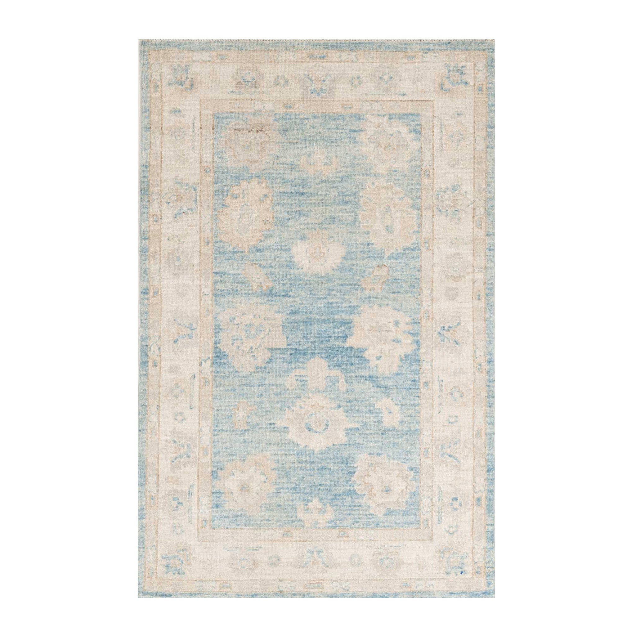 Traditional cornflower blue 3x5 Oushak area rug with muted ivory floral palmettes and a distressed cream border.
