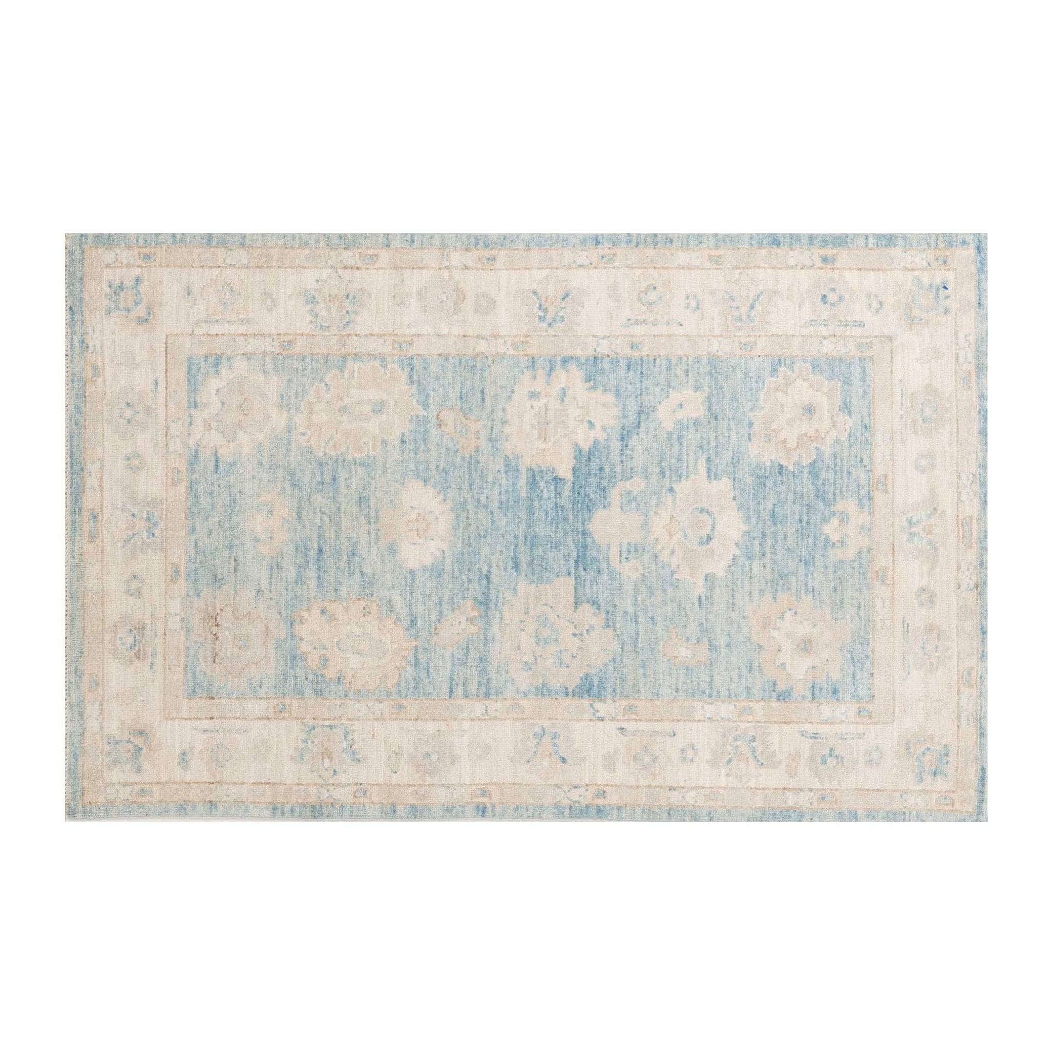 Traditional cornflower blue 3x5 Oushak area rug with muted ivory floral palmettes and a distressed cream border.