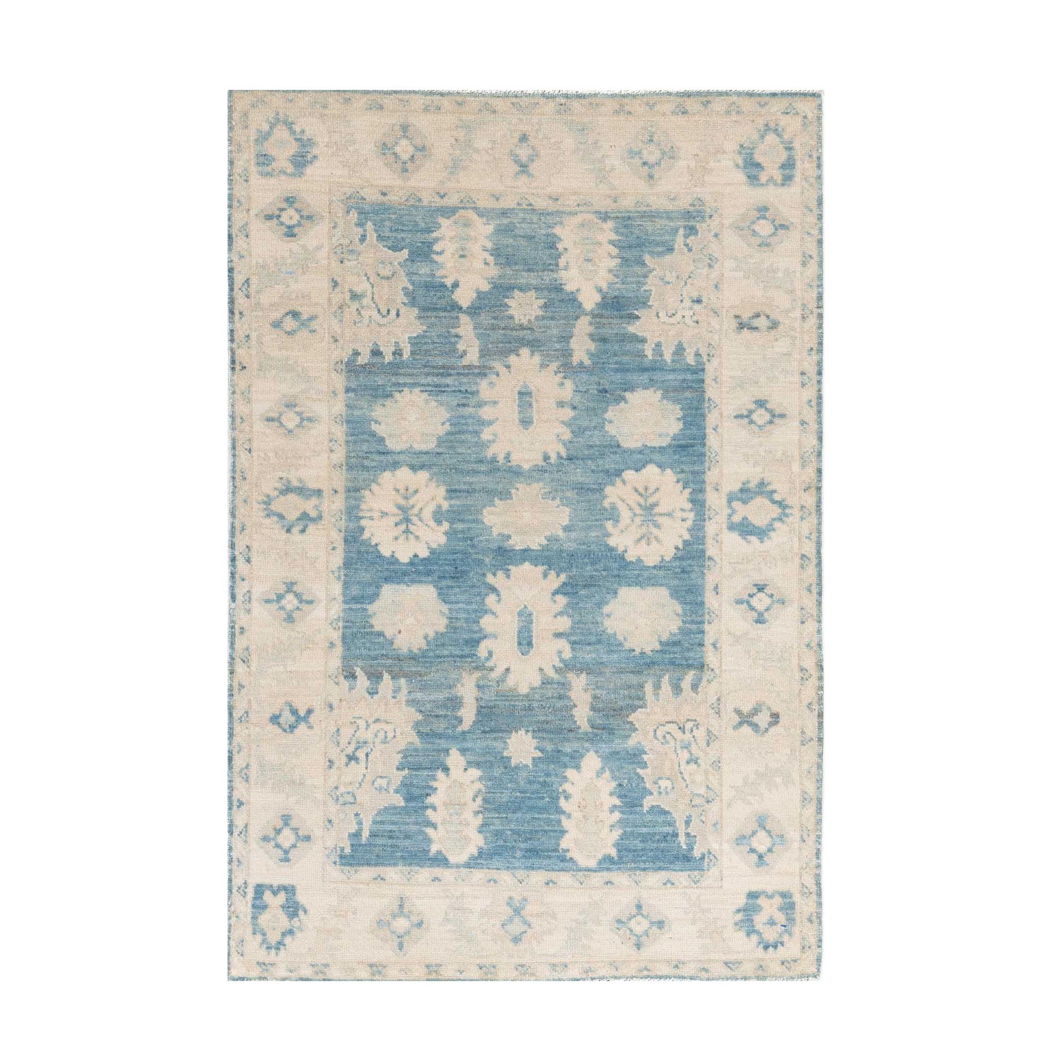 Traditional dark blue 3x5 Oushak area rug with soft ivory and beige geometric medallions and a distressed finish.