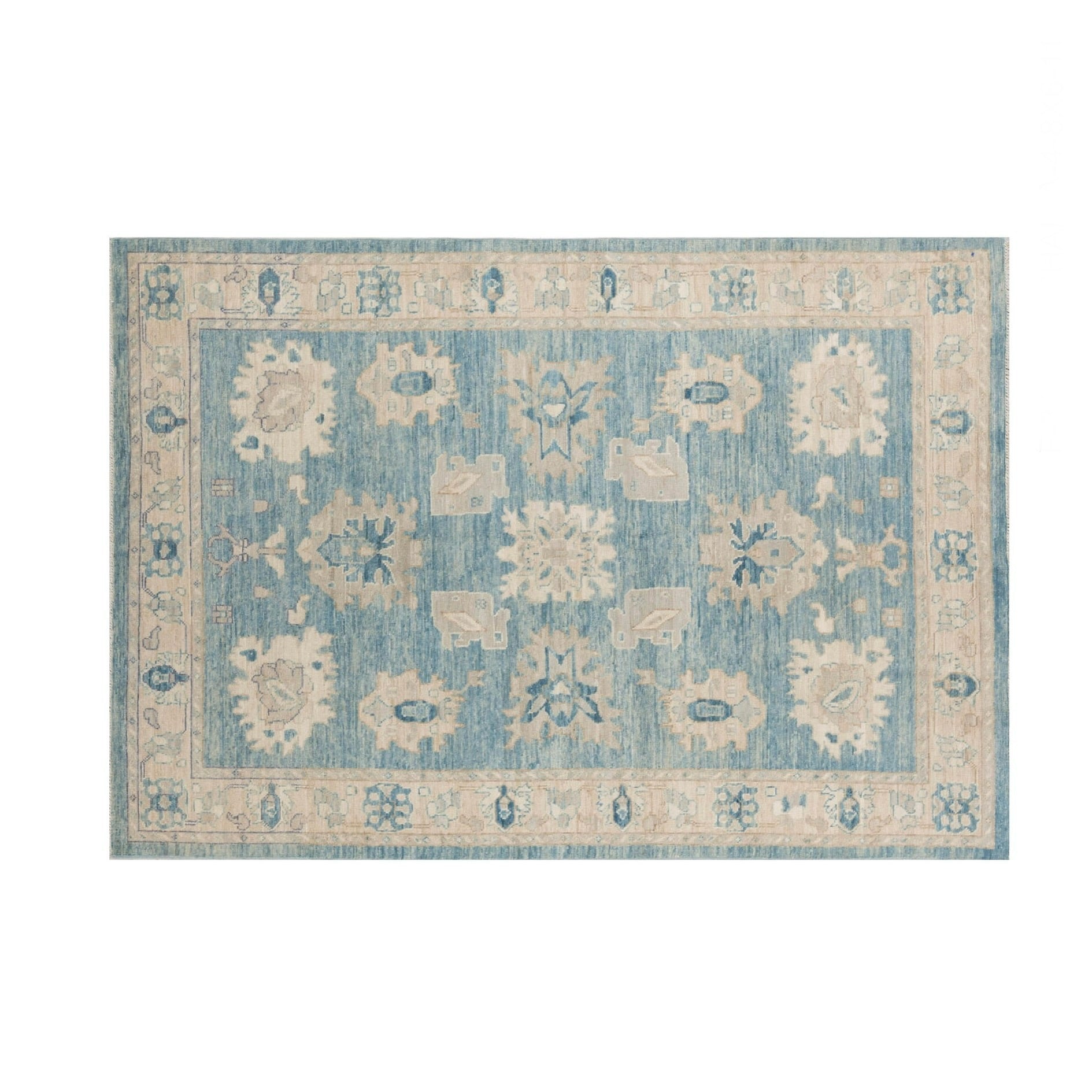 Rich slate blue 5x7 Oushak area rug with ivory cream floral palmettes and a wide cream border.