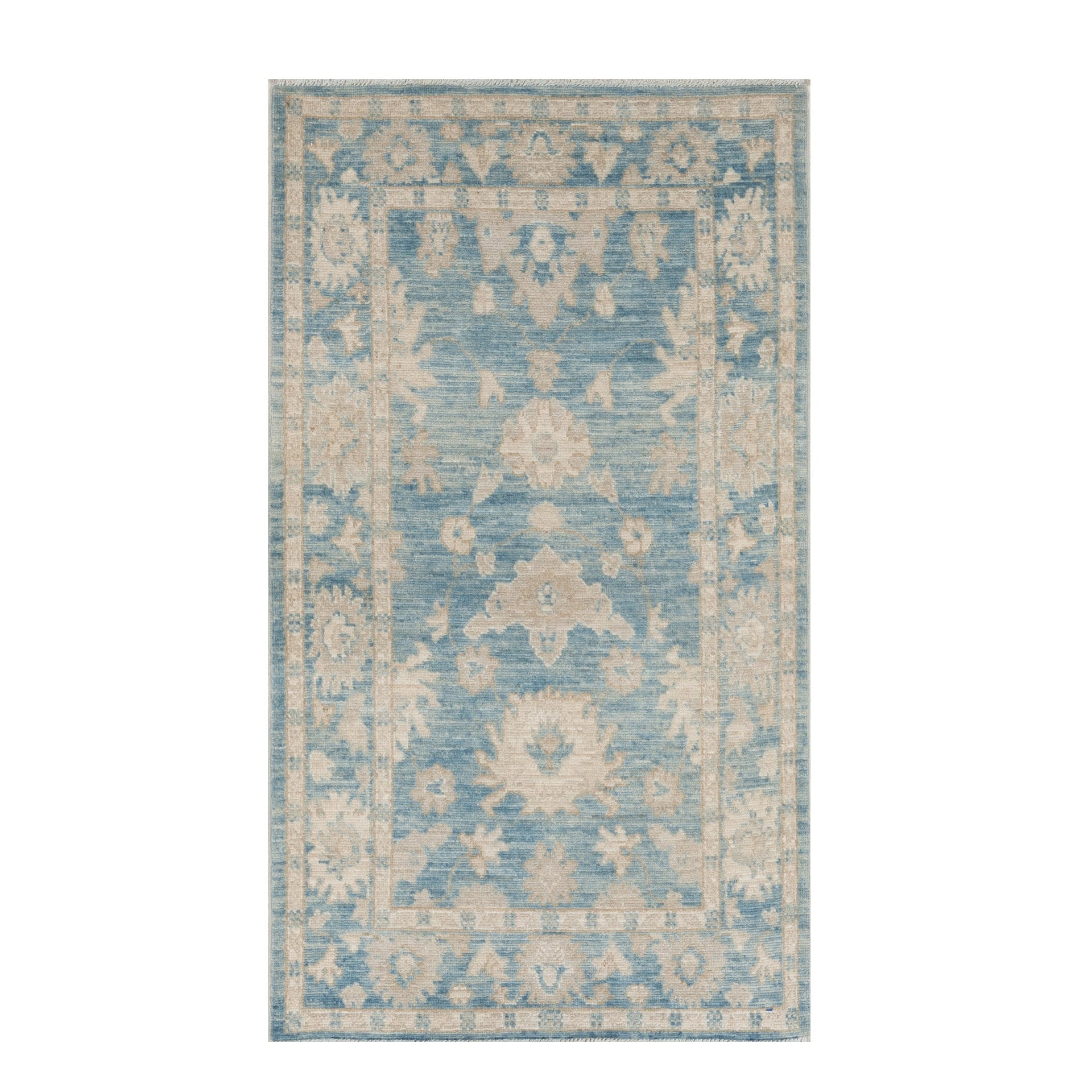 Vibrant medium blue 3x5 Oushak area rug with warm beige geometric star medallions and a distressed floral border.