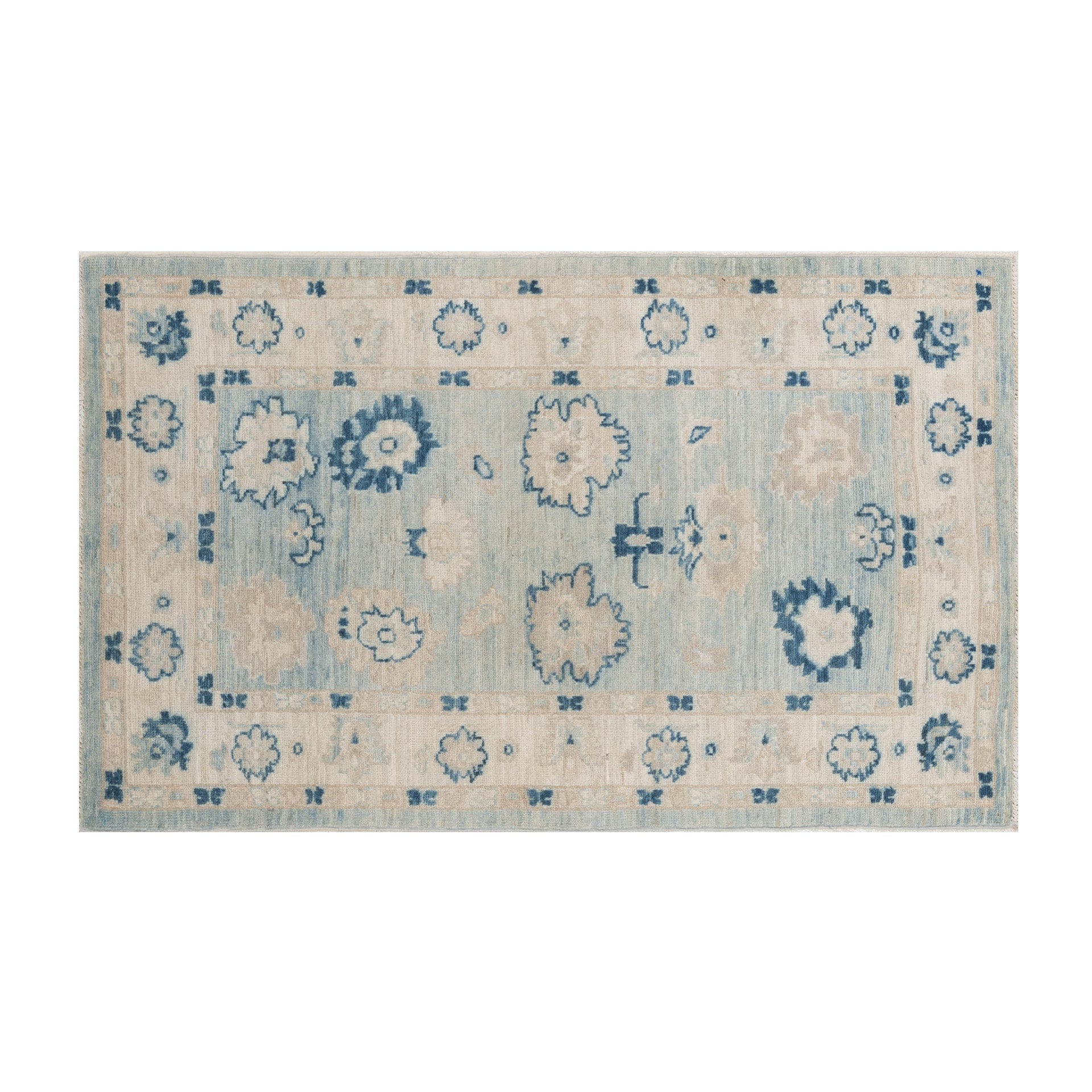 Soft light blue 3x5 Oushak area rug with a muted beige floral pattern, ivory borders, and distressed navy blue accents.