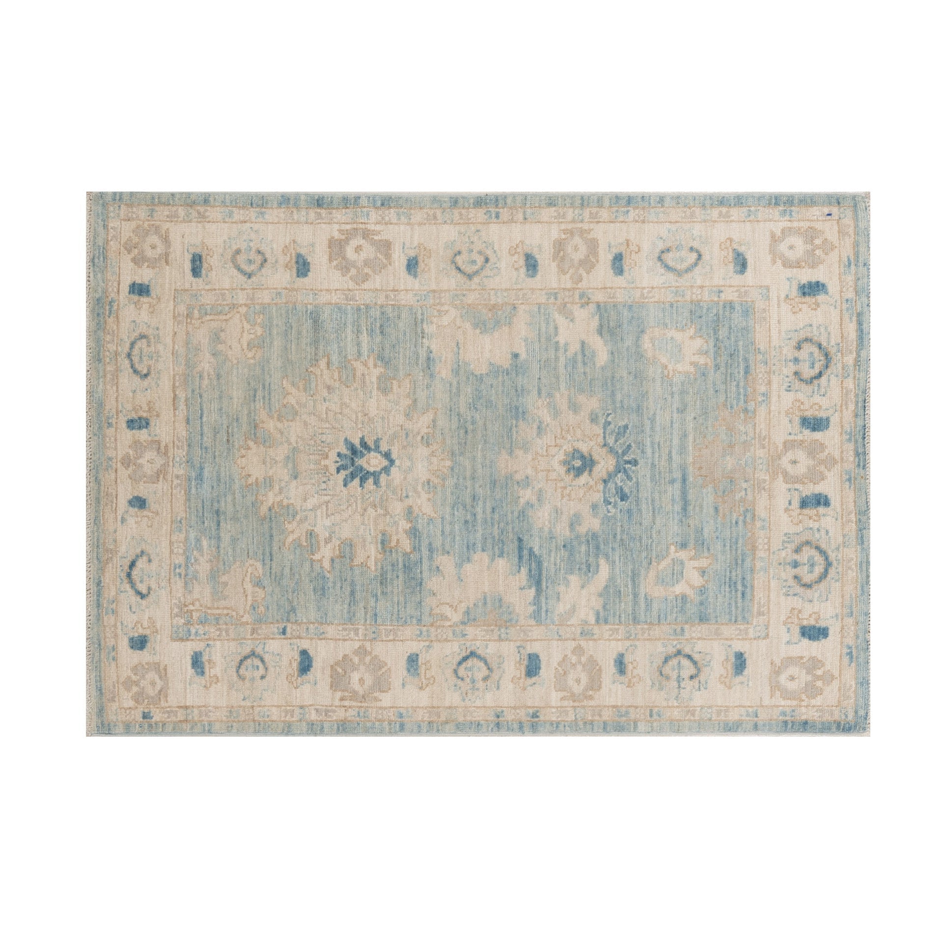 Weathered denim blue 3x5 Oushak area rug with large ivory and sand floral medallions, dark blue accents, and a cream border.