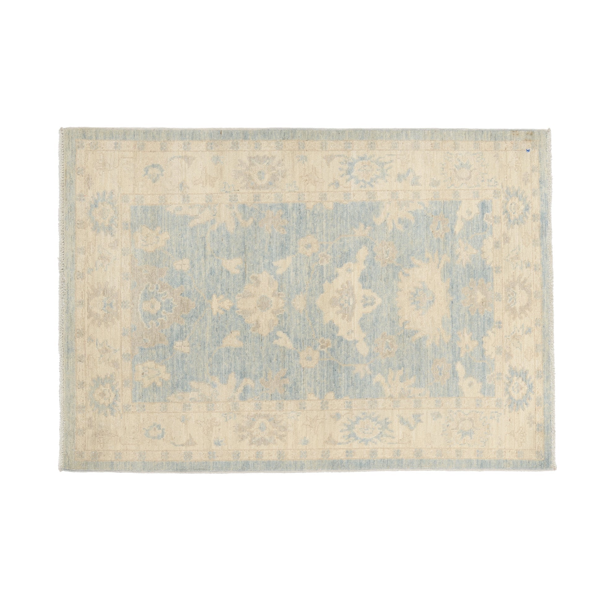 Soft light blue 3x5 Oushak area rug with a muted beige and ivory floral pattern, cream borders, and a distressed low pile finish.