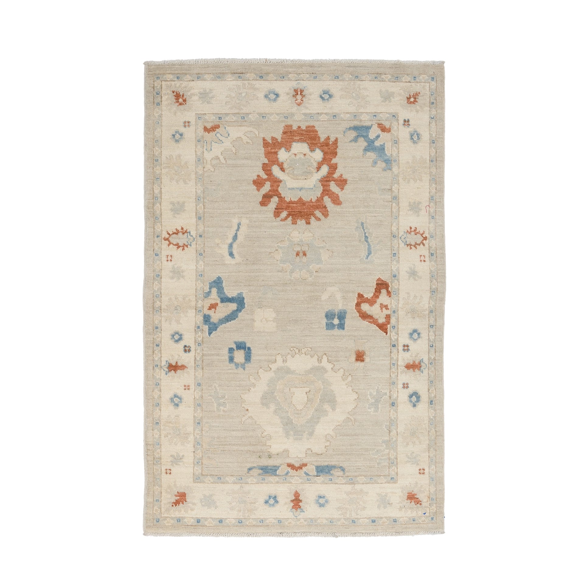 Muted beige 3x5 Oushak area rug with prominent rust and blue geometric floral medallions and a cream border.