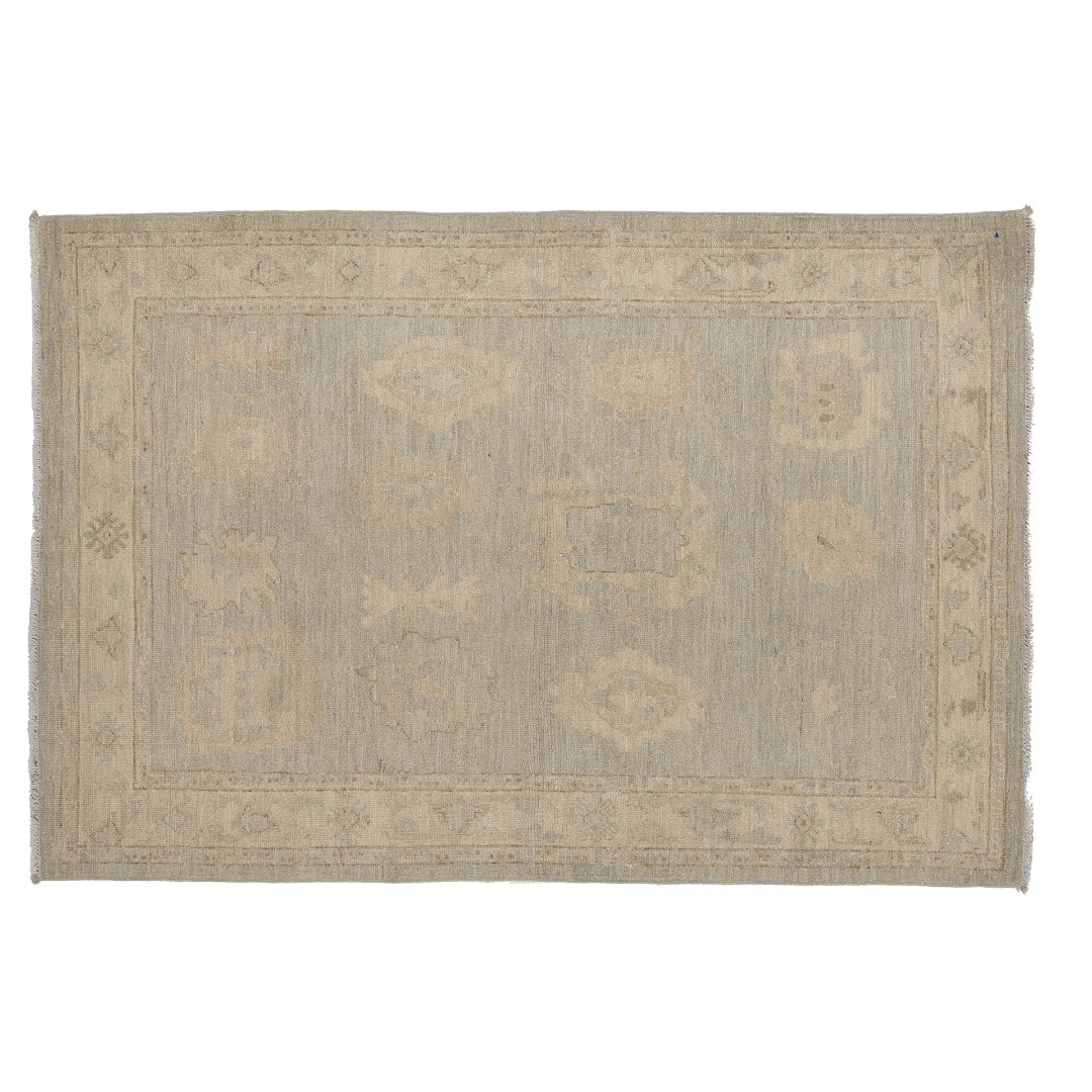 Ultra-faded pale blue 4x6 Oushak area rug with cream and beige floating geometric medallions.