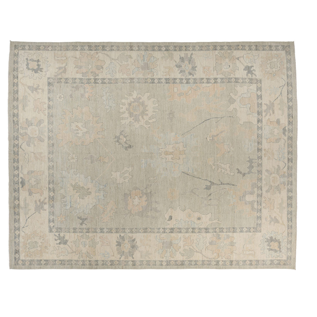 Soft light green 10x14 Oushak area rug with cream floral palmettes and subtle blush accents.