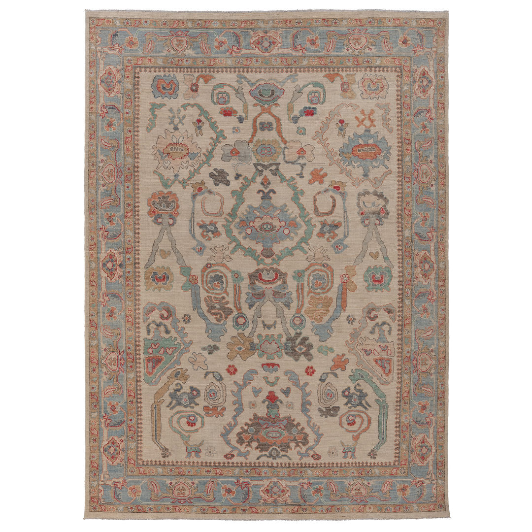 Hand-knotted 9x12 Oushak area rug with an ivory field, multi-color red and peach motifs, and a light blue border.