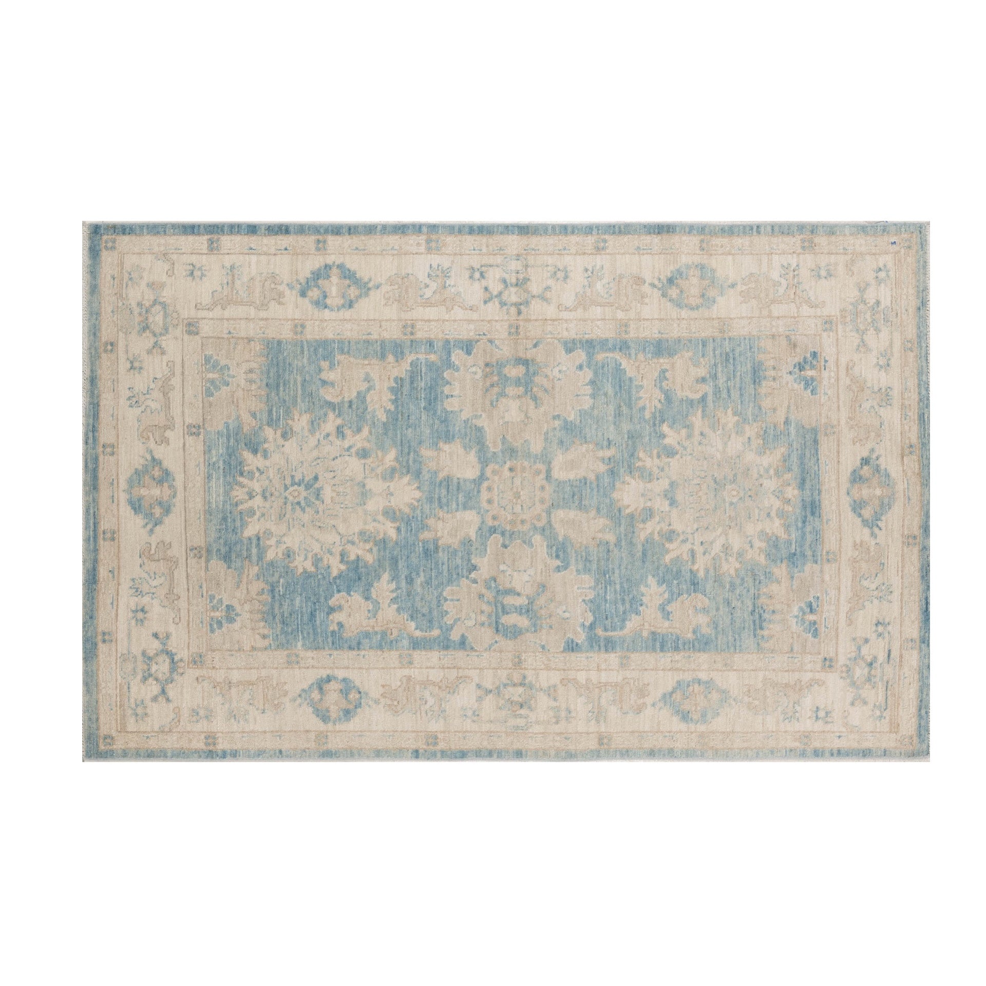 Traditional blue 4x7 Oushak area rug with warm sand and cream star medallions and a distressed border.
