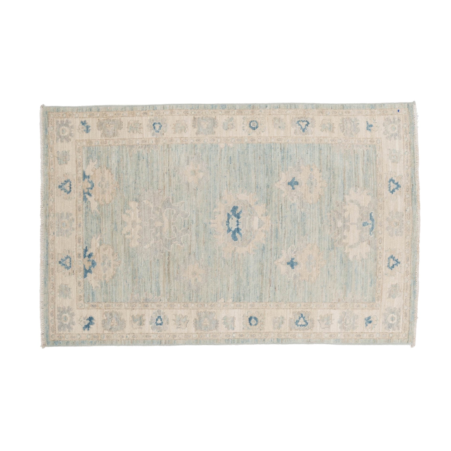 Soft light teal 3x5 Oushak area rug with cream floral palmettes and a wide beige border.