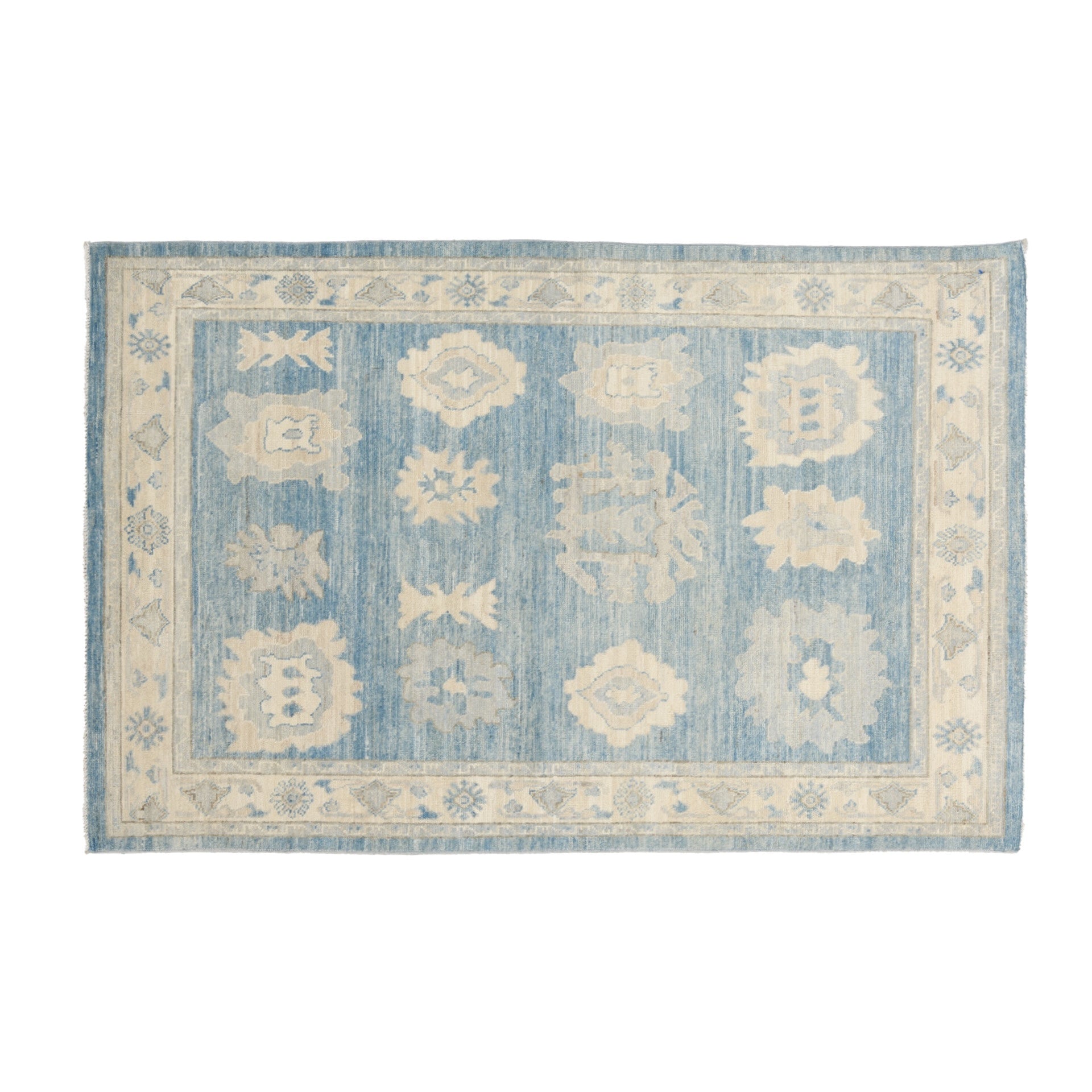 Sky blue 4x6 Oushak accent rug with strié texture, cream floral cartouches, and khaki accents.