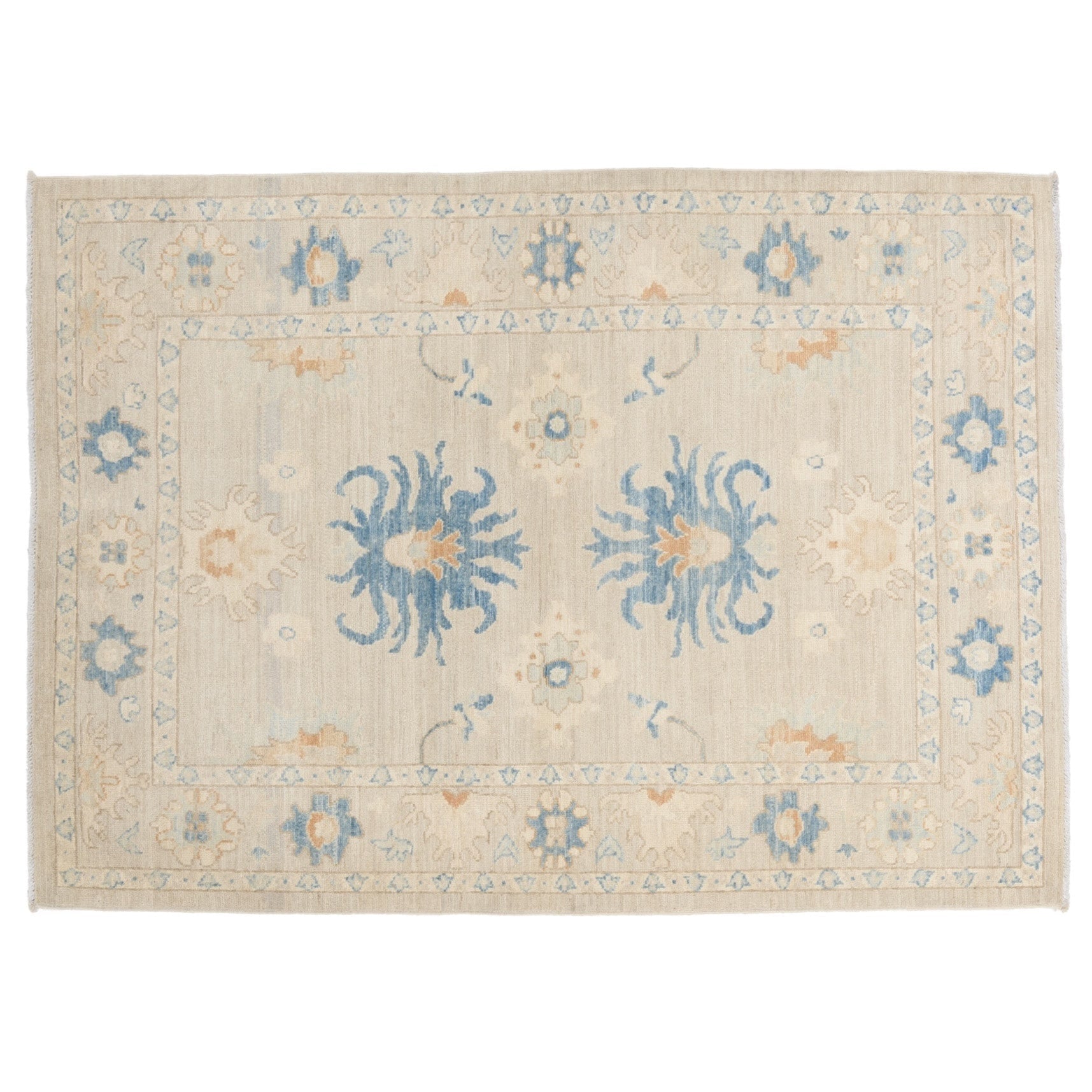 Soft taupe 4x6 Oushak area rug with bold teal blue central palmettes and rust accents.