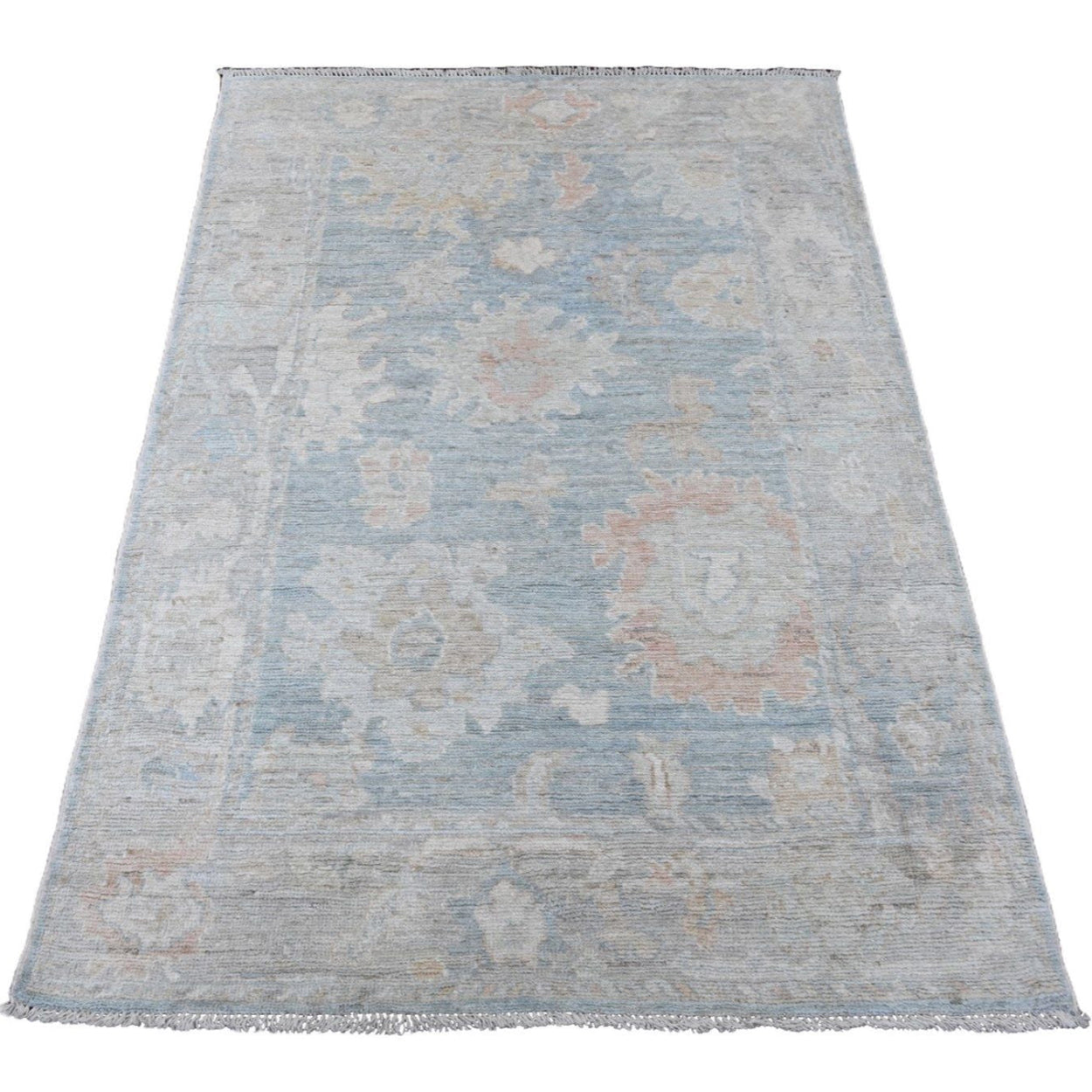 Soft light blue 4x6 Oushak area rug with blush pink and cream floral medallions.