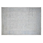 Ultra-muted cream and tan 10x14 Oushak area rug with soft blue geometric and floral motifs.