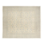 Luminous cream 12x15 Khotan area rug with periwinkle blue pomegranate lattice and geometric borders.