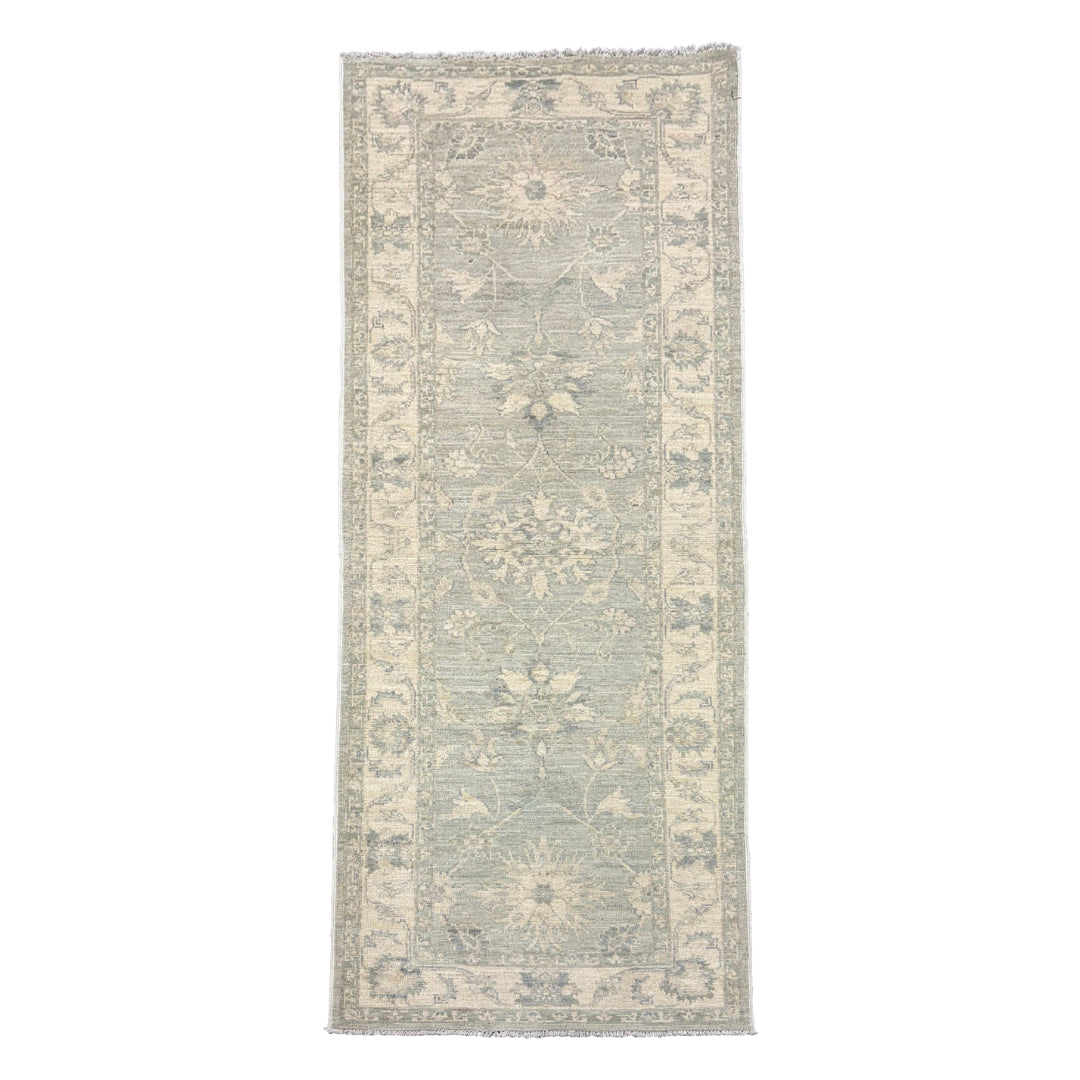 Sage green 2.5x8 Oushak runner rug with ivory floral lotus medallions and a wide cream border.
