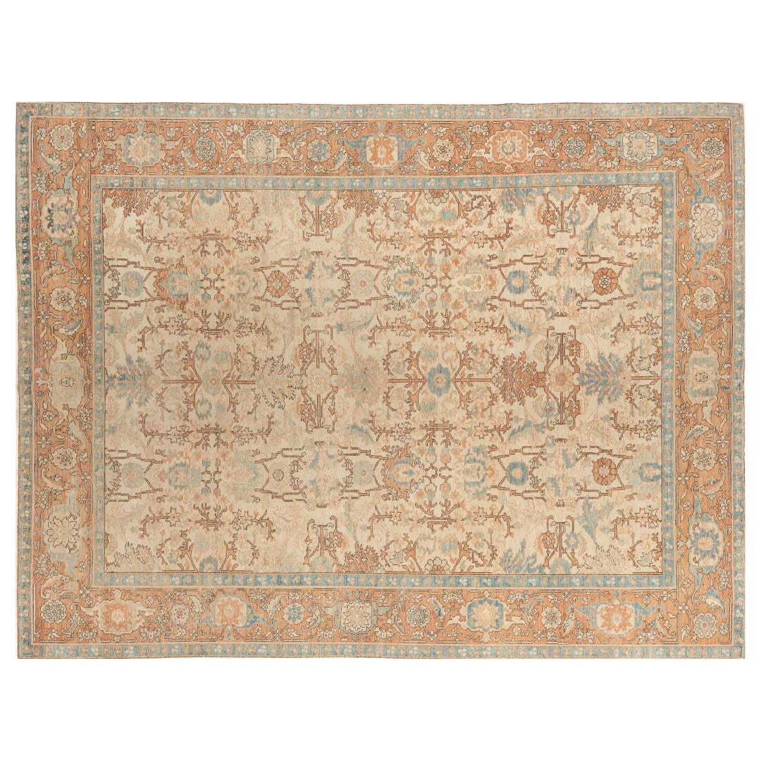 Hand-knotted 9x12 Serapi area rug with a vintage botanical pattern in terracotta rust and soft light blue.