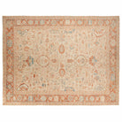 Hand-knotted 10x14 Serapi area rug with an ivory neutral field, geometric terracotta borders, and light blue accents.