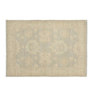 Pale blue 4x6 Oushak area rug with two central cream lotus medallions and a wide beige floral border.