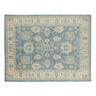 Warm coral-terracotta 9x12 Serapi area rug with cream floral motifs and a deep espresso brown border.