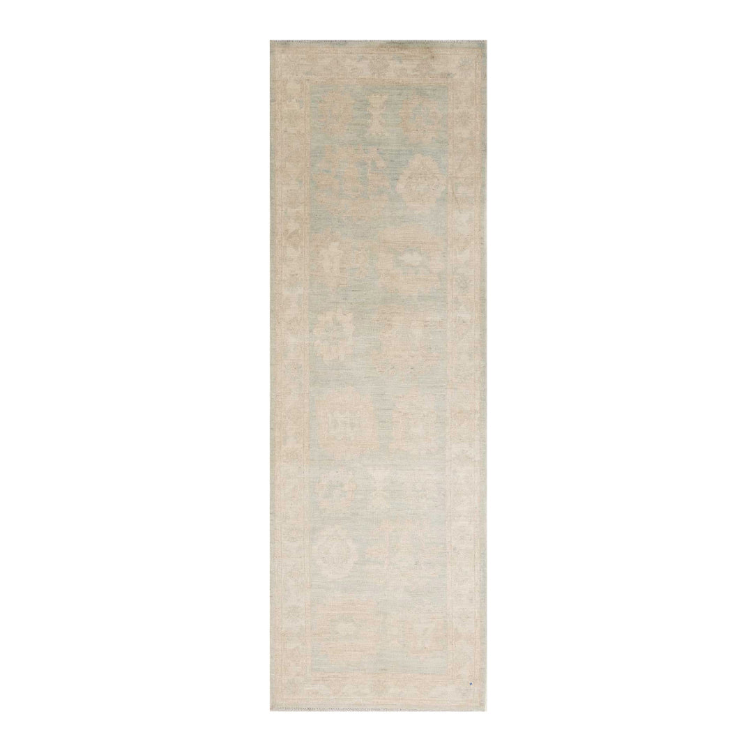 Ultra-faded light green 2.5x10 Oushak runner rug with floating ivory geometric medallions and a soft cream border.