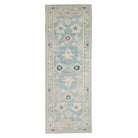 Vibrant medium blue traditional Oushak runner rug with ivory and dark blue geometric star medallions and a cream vine border.