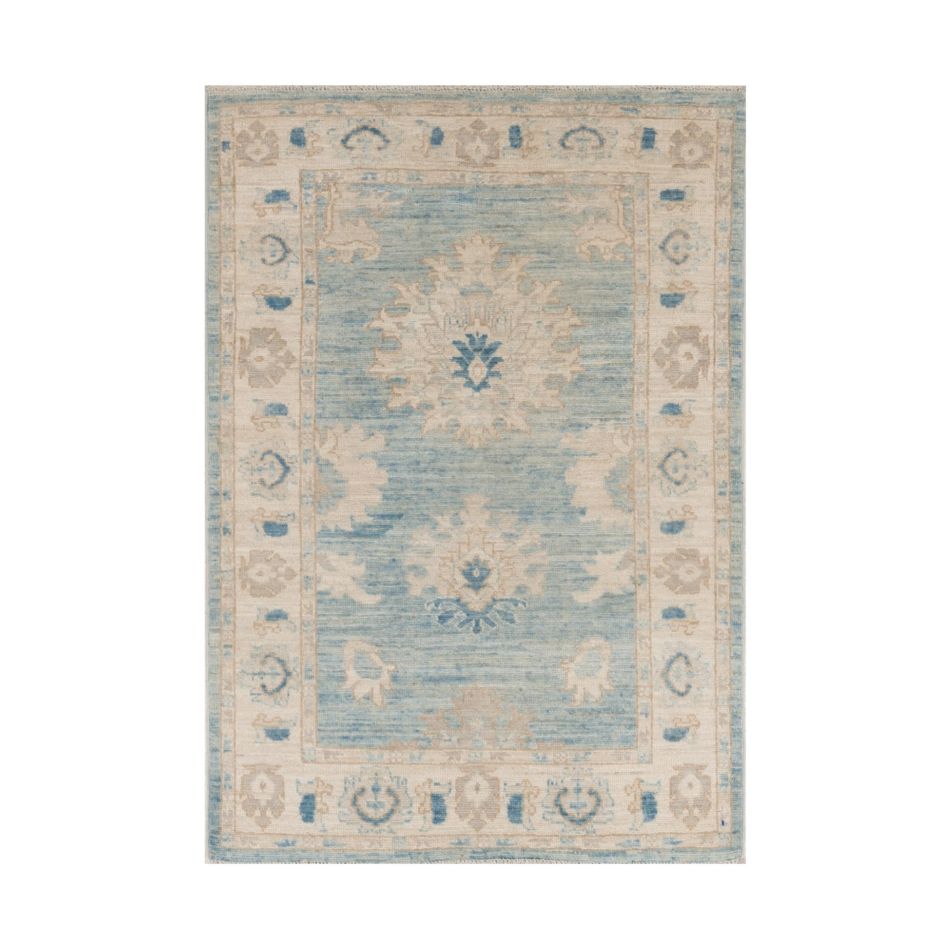 Weathered denim blue 3x5 Oushak area rug with large ivory and sand floral medallions, dark blue accents, and a cream border.