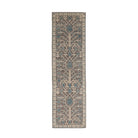 Earthy brown traditional Oushak runner rug displaying a geometric blue and beige tree of life motif with a cream border.
