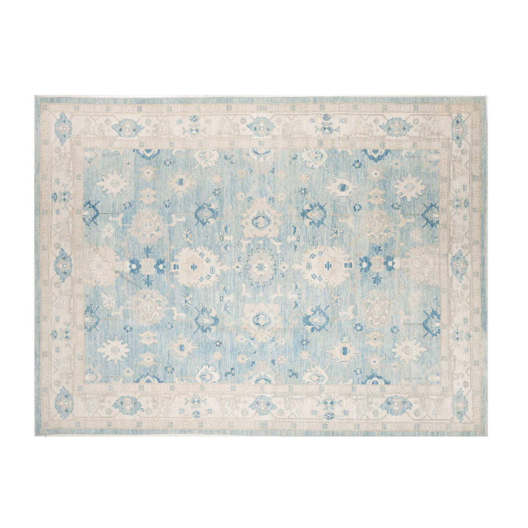 Denim blue 9x12 Oushak area rug with ivory star medallions and navy geometric accents.