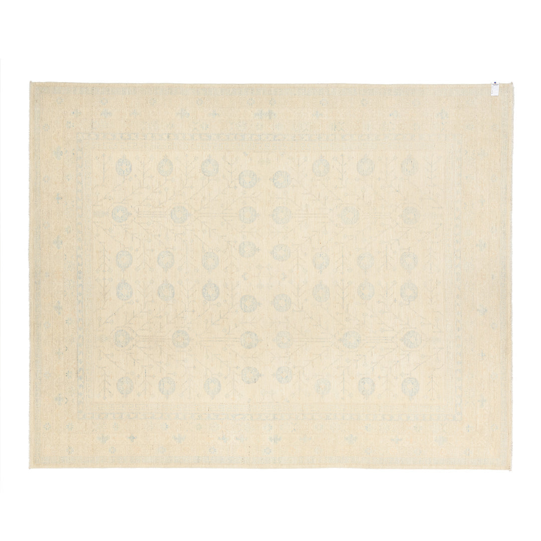 Ultra-faded ivory and cream 9x12 Oushak area rug with delicate light blue geometric tree motifs.