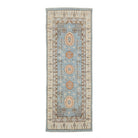 Light blue Oushak area rug runner with peach oval medallions and a wide ivory border with tree motifs.