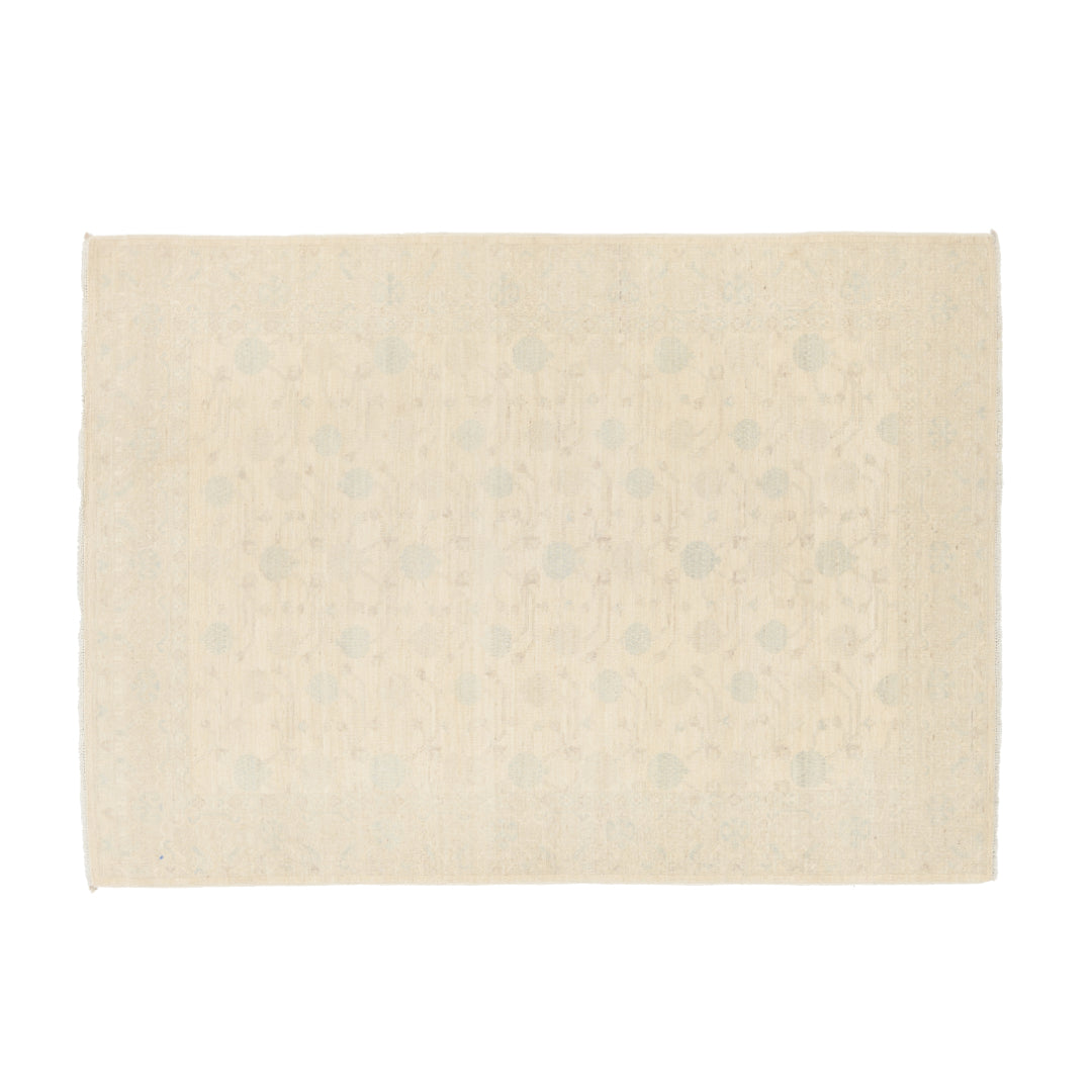 Ultra-faded ivory 5x7 Oushak area rug with delicate light blue floral motifs and subtle abrash texture.