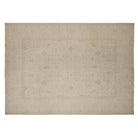 Tone-on-tone alabaster 10x14 Oushak area rug with pale linen geometric motifs and soft greige details.