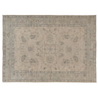 Hand-knotted 10x14 Oushak area rug with a soft ivory field, light blue-grey border, and detailed botanical motifs.