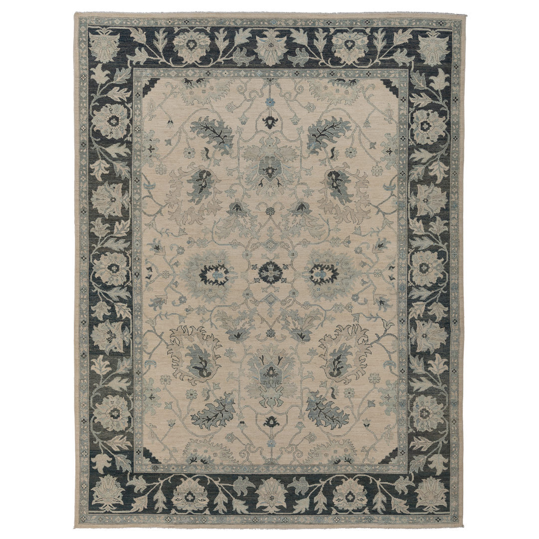 Hand-knotted 10x14 Oushak area rug with a light ivory center field, bold charcoal border, and soft blue accents.
