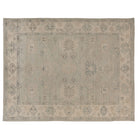 Hand-knotted 9x12 Oushak area rug with a muted greenish-blue field, soft camel palmettes, and an ivory border.
