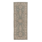 Sage green 2.5x8 Oushak runner rug with camel star cartouches and a warm beige floral border.