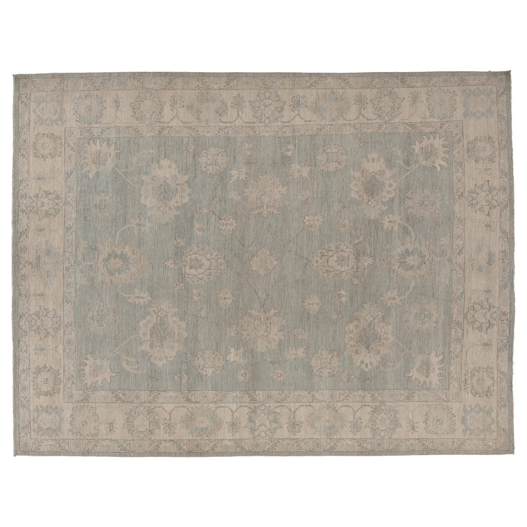 Hand-knotted 9x12 Oushak area rug with a muted aqua field, soft ivory palmettes, and a cream-beige border.