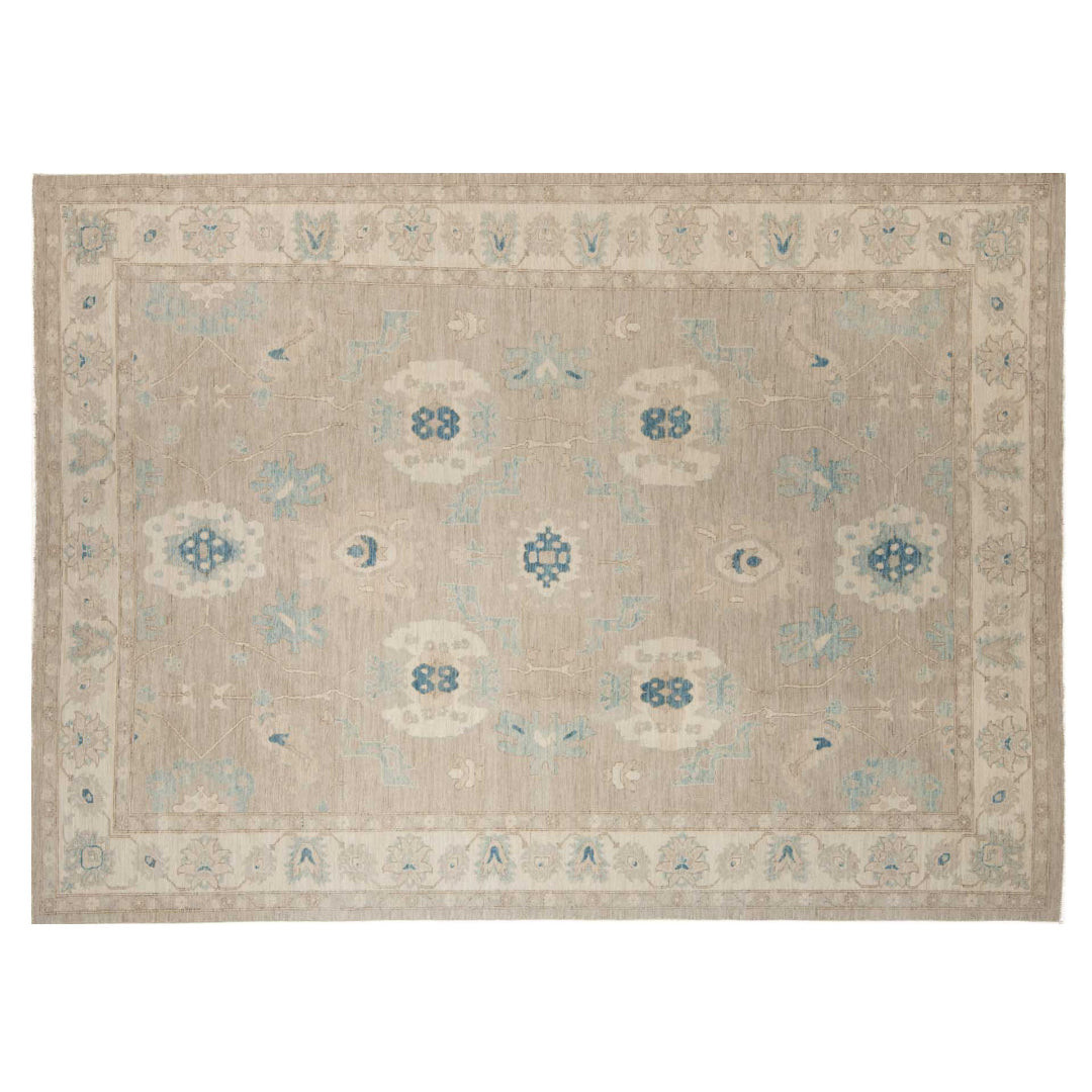 Warm camel 10x14 Oushak area rug with ivory cartouches and medium blue geometric accents.