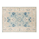 Denim blue 5x7 Oushak area rug with ivory central medallion and navy geometric accents.