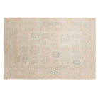 Ultra-faded cream 6x9 Oushak area rug with taupe floral motifs and soft slate blue accents.