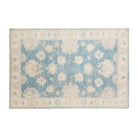 Vibrant aqua blue 6x9 Oushak area rug with cream floral palmettes and taupe accents.